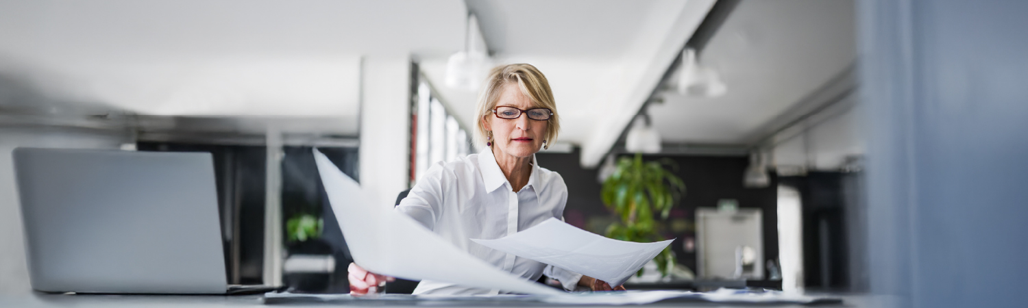 business owner looking at documents 
